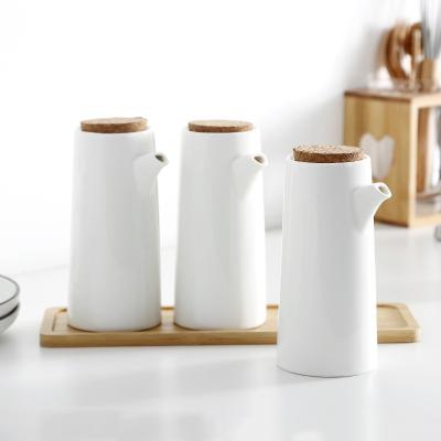 China Viable Kitchen Spice Jars Condiments Vinegar Oil Seasoning Storage Container Ceramic With Lid Bung Can for sale