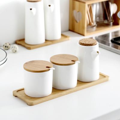 China Viable Kitchen Spice Jars Condiments Vinegar Oil Seasoning Storage Container Ceramic With Lid Bung Can for sale