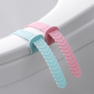 China Creative Modern Toilet Seat Lift Silicone Lid Lifter Handle Paste Lid Lifter Flip Lid Opener for sale