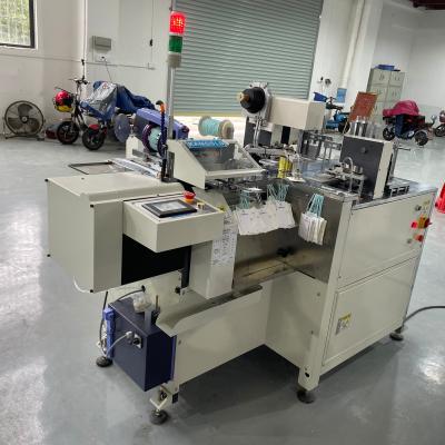 China 2021 Newly Automatic Food Label Threading Machine With Eyelet for sale