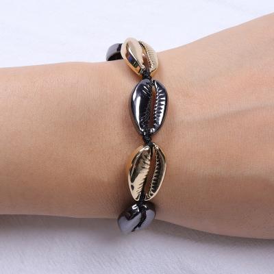 China FASHIONABLE Sea Shell Elastic Women Woven Gold Plating Alloy Bracelet Attach With Shell For Beach Bracelet Jewelry Making for sale