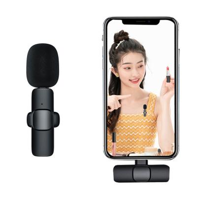 China Professional Microphone 2022 New K1 mini 2.4G Tik Tok Show Portable Audio Video Conference Recording Wireless Lavalier Microphone for iPhone Live Broadcast Gaming for sale