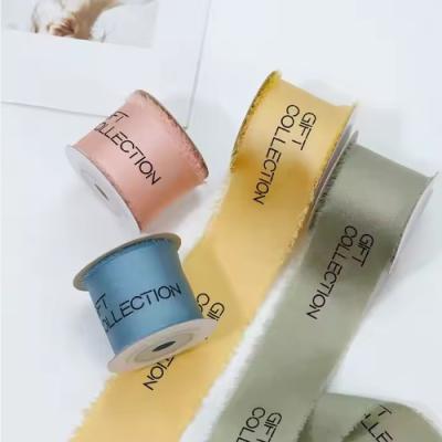 China Silk Screen Printed Chiffon Satin Ribbon in Many Colors for Custom Torn Edge Wrapping for sale