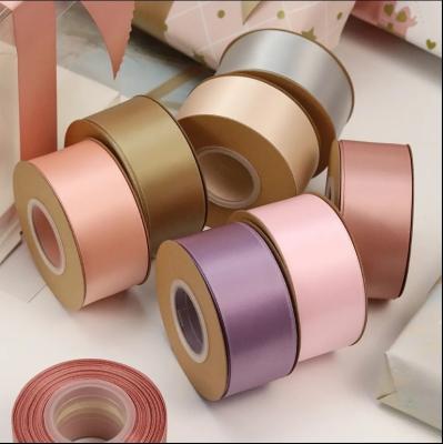 China Custom Double Sided Satin Wrap Ribbon Sustainable Decoration Silk Ribbon Ivory Purple for sale