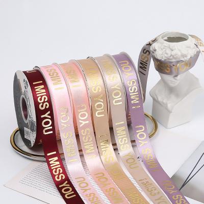 China La cinta del papel de regalo del satén de Rose Gold Pink Red 2.5cmX45Y modeló la cinta grosgrain en venta