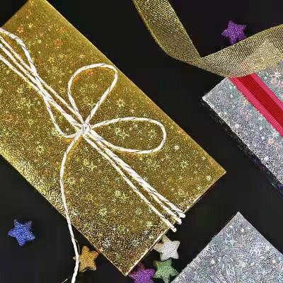 China Goldsilbernes Funkeln-Sparkly Geschenk-Verpackungs-Papier-Rollenkunststoffplatte 72cmx52cm zu verkaufen