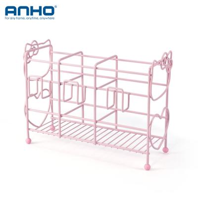 China Bathroom Viable Counter Organizer Pink Stainless Steel Hair Tool Storage Rack Hair Dryer Table Rack for sale