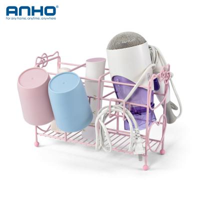 China Sustainable Fashion Bathroom Accessories Desk Stand Pink Stainless Steel Wire Shelf Hair Dryer Rack for sale