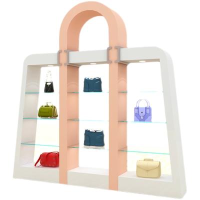 China Creative Minimalist Design Bag Special Shaped Display Cabinet All Shopping Mall Solid Wood Display Rack for sale