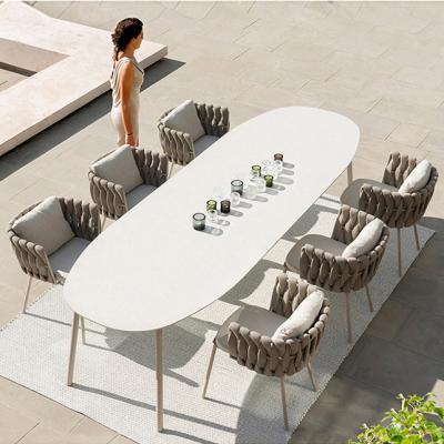 China Modern Modern Royal Hotel Rope Dining Set Patio Furniture Balcony Dining Table And 6 Seater Chair Outdoor Garden Furniture for sale