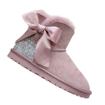 China New ladies winter fashion trend ladies sheepskin fur sequin bow silk one-piece warm plush ankle boots snow boots for sale