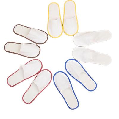 China Thickened Non-Woven Non-Woven Comfortable Hotel Slip Room Disposable Slippers for sale