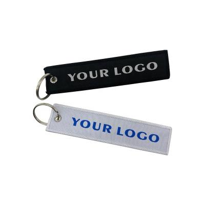 China Company Logo Keychain Embroidery Fabric Custom Fashion Woven Cheap Promotional Kidnap Theft Jet Tag Keychain for sale