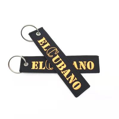 China Custom Woven Key Chain Jet Key Tag Personalized Gift Key Chain Woven Fabric Sublimation Remove Front Embroidered Key Chain for sale