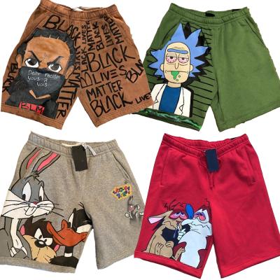 China New Anti-wrinkle summer men's clothing street cartoon pattern casual shorts stretch loose straight leg pants sports five-point pants for sale