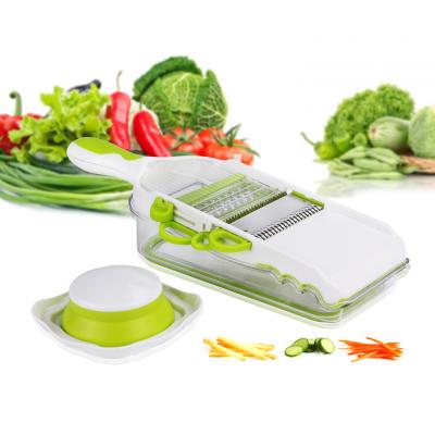 China Multifunctional Viable 4 in 1 Unique Stainless Steel Multi-Blade Magic Manual Household Helper Design Kitchen Vegetable Grater for sale