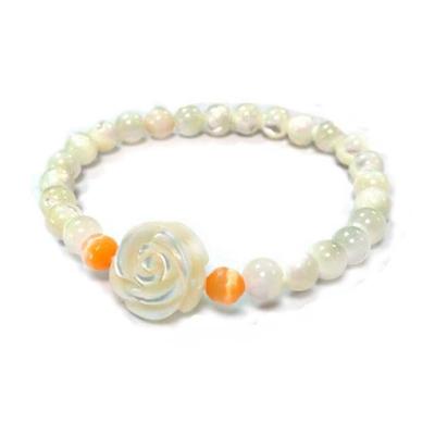 China BOHEMIA Shell Rose Elastic Natural Hand Made Shell Flower Bracelet Shell Faceted Bead Cut Out Round Faceted Cats Eye Stretch for sale