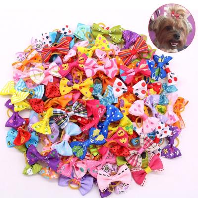 China Viable Cheap Wholesale Dog Hair Bows With Elastic Bands For Ears Mixed Colors PHB01 for sale