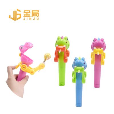 China Cartoon Toys Funny Candy Toy Lollipop Holder Toy Dinosaur Lollipop Saver Plastic Kids Candy Candy for sale