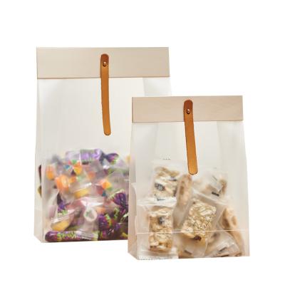 China Moisture Proof Portable Transparent PP Frosted Self Standing Bag Nougat Plastic Snacks Packaging Dry Bag For Bread for sale