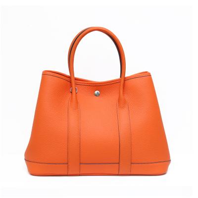 China Large capacity fashion leather women's bag head layer whip multifunctional portable One-shoulder diagonal bag for sale