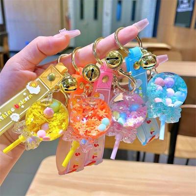 China 2023 plastic keychain creative lollipop shape quicksand cute creative cartoon acrylic key chain floating liquid key chain for sale