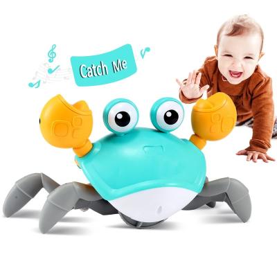 China Baby Motivator Induction Crab Tummy Time Automatic Crawling Crawling Crawling Toy With Music And Led Light Up for sale