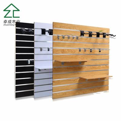 China Realistic wood grain slatwallwall shelf wholesale/1220*1220mm MDF slatwall panels for sale