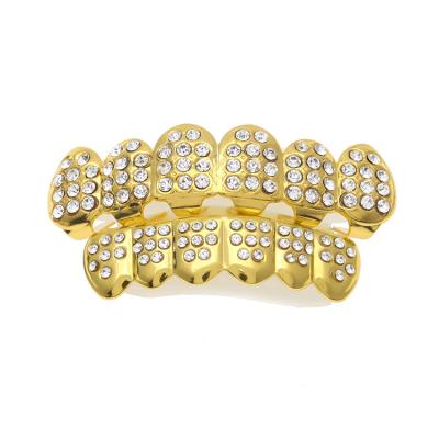 China Hip Hop Blingbling Hiphop Iced Out Gold Rhinestone Top&Bottom Teeth Grillz for sale