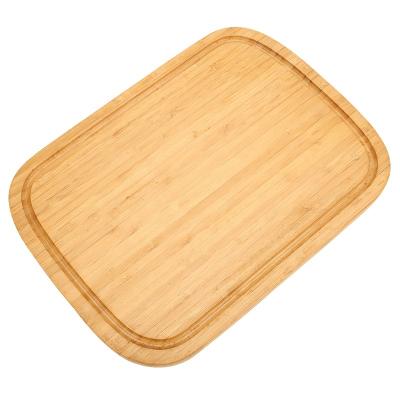 China Sustainable Factory Wholesale Oval Shape Durable Bamboo Cutting Board Chopper With Juice Groove for sale