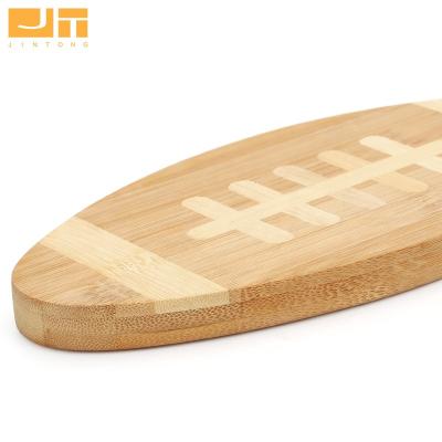 China Plant Sustainable Natural Bamboo Football Shaped Cutting Board Serving Tray For Kitchen for sale