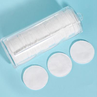 China New Launched Wholesale Cosmetic Highly Absorbent Lint Free Disposable Cotton Pads Daily Cleansing Makeup Pads In Glass Tube for sale