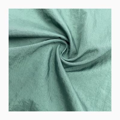 China New Product Waterproof Wrinkle Resistant Taffeta 210T Dyed Woven Lightweight Nylon Umbrella Fabric for sale