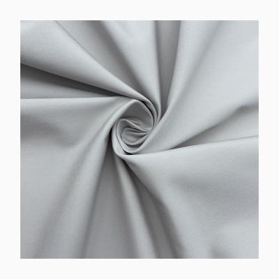 China Waterproof Factory Price Wrinkle Resistant Stretch Acetic Cotton 100 Polyester Feeling Fabric for sale