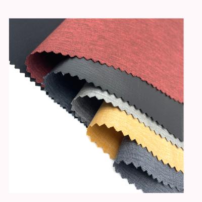 China 100% Medium Thickness Polyester Fabrics Winter Thickness Polyester Fabric Waterproof Cationic Stain Fabric For Coat for sale