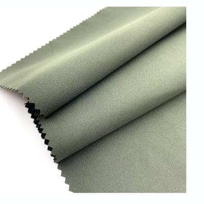 China Factory 2021 New Fashion Army Green Wholesale High Elastic Woven Polyester 100% Wind Proof Cloth Machine Cloth Machine Pongee Fabric for sale