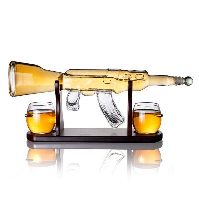 China Amazon Hot Sale 800ml Wooden Base Ak 47 Rifle Gun Luxury Creative Large Whiskey Decanter Set With 2 Whiskey Glasses for sale