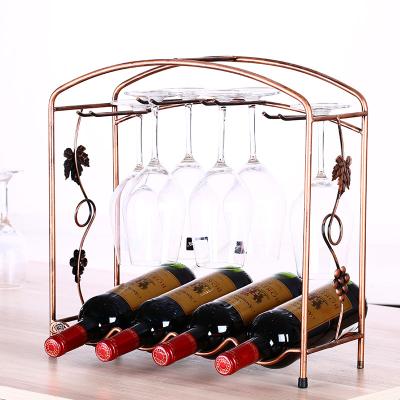 China Creative Viable 4pcs Stainless Steel Wine Bottle Display Rack Rack Ornament Wine Glass Hanging Rack for sale