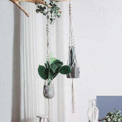 China New Fashion Macrame Plant Pot Holder Indoor Garden Macrame Plant Bohemian Hanger for sale