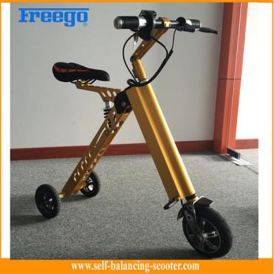 China Vespa eléctrica plegable anaranjada para los niños, mini bicicleta eléctrica doblada de 36v 250w en venta