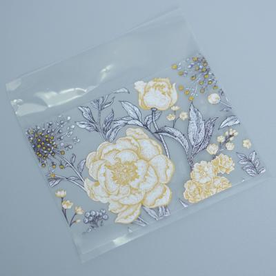 China Waterproof Clean Brand BOPP Flower Logo Label Sticker Custom High-grade Transparent Waterproof Printing Roll for sale