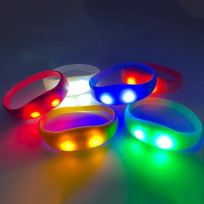 China Firmly On Wedding Decoration Custom LOGO Light Up Glow Silicone Wristband Sound Activated LED Wristband for sale