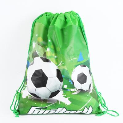 China Custom Promotional Non Woven Waterproof Kids Pouch Cloth Bag Small Drawstring Gift Bags Football Pattern For Boys for sale