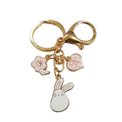 China Customized Wholesale Soft Metal Craft Enamel Silver Gold Logo Airpods Key Chain Key Chain With Ring Clasp Custom for sale