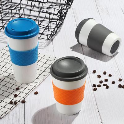 China 16oz Custom Reusable Double Wall Coffee Custom Plastic Insulated Reusable Coffee Cup Spirit Sustainable With Lid Silicone Sleeve for sale