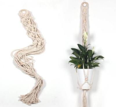 China Hot Bohemian on the Amazon Handmade Macrame Plant Hanger for Home Decor for sale