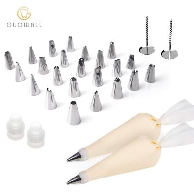 China Viable 29pcs Cake Decorating Icing Plastic Tip Set Silicone Pastry Bag Couplers Flower Nails for sale