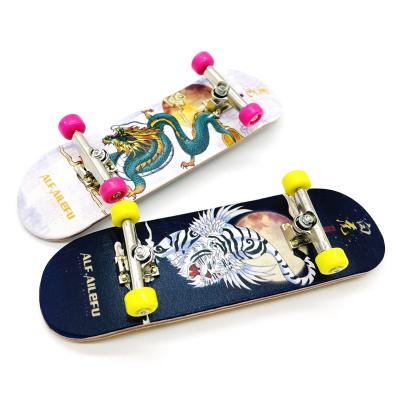 China Wholesale new professional wood finger skateboard mini fingertip skateboard youth maple toy source manufacturer creative for sale