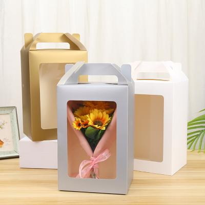 China Creative Wholesale Recyclable Flower Paper Bag Bouquet Waterproof Handbag With Clear PVC Window for sale