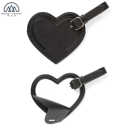 China Leather Stylish Custom Travel Luggage Bag Heart Shaped Black Leather Tag for sale